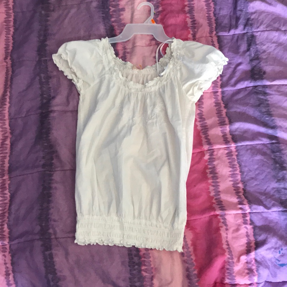 White ruffled shirt